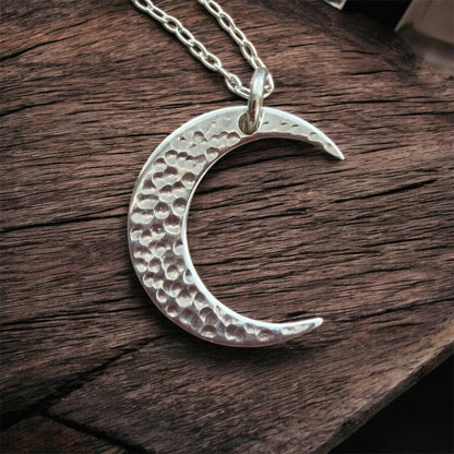 Crescent moon sterling silver necklace.