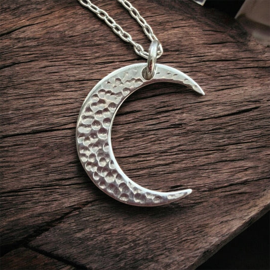Crescent moon sterling silver necklace.