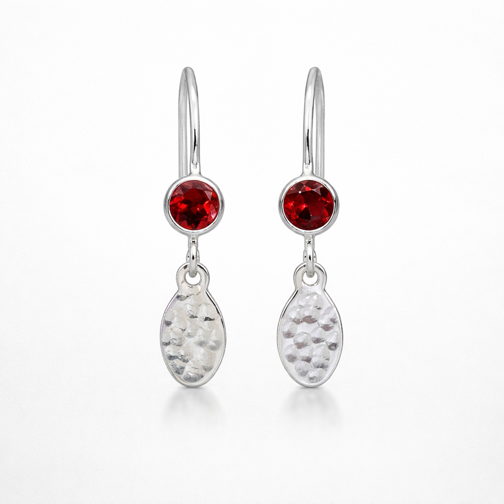Garnet birthstone sterling silver dangle textured oval earrings.