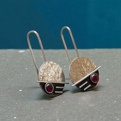 Sterling silver garnet earrings.