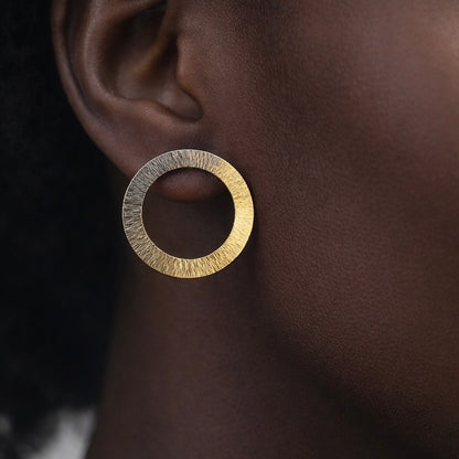 Gold plated and oxidised sterling silver circle earrings.