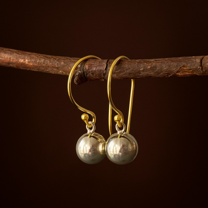 Gold and silver ball dangle earrings