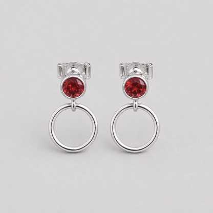 Garnet sterling silver circle earrings.