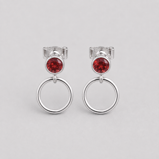 Garnet sterling silver circle earrings.