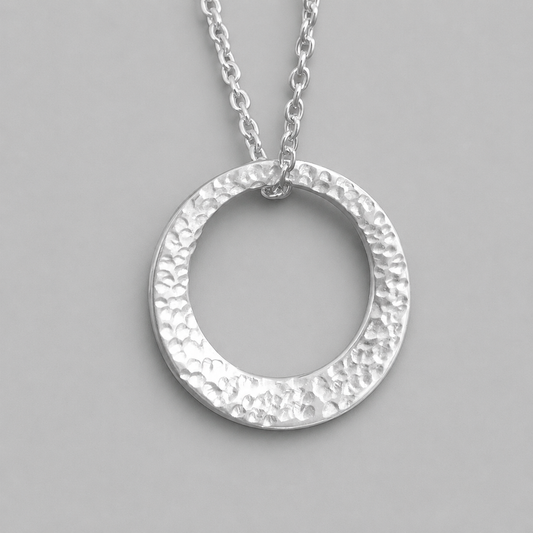 Minimalist hammered sterling silver washer necklace.