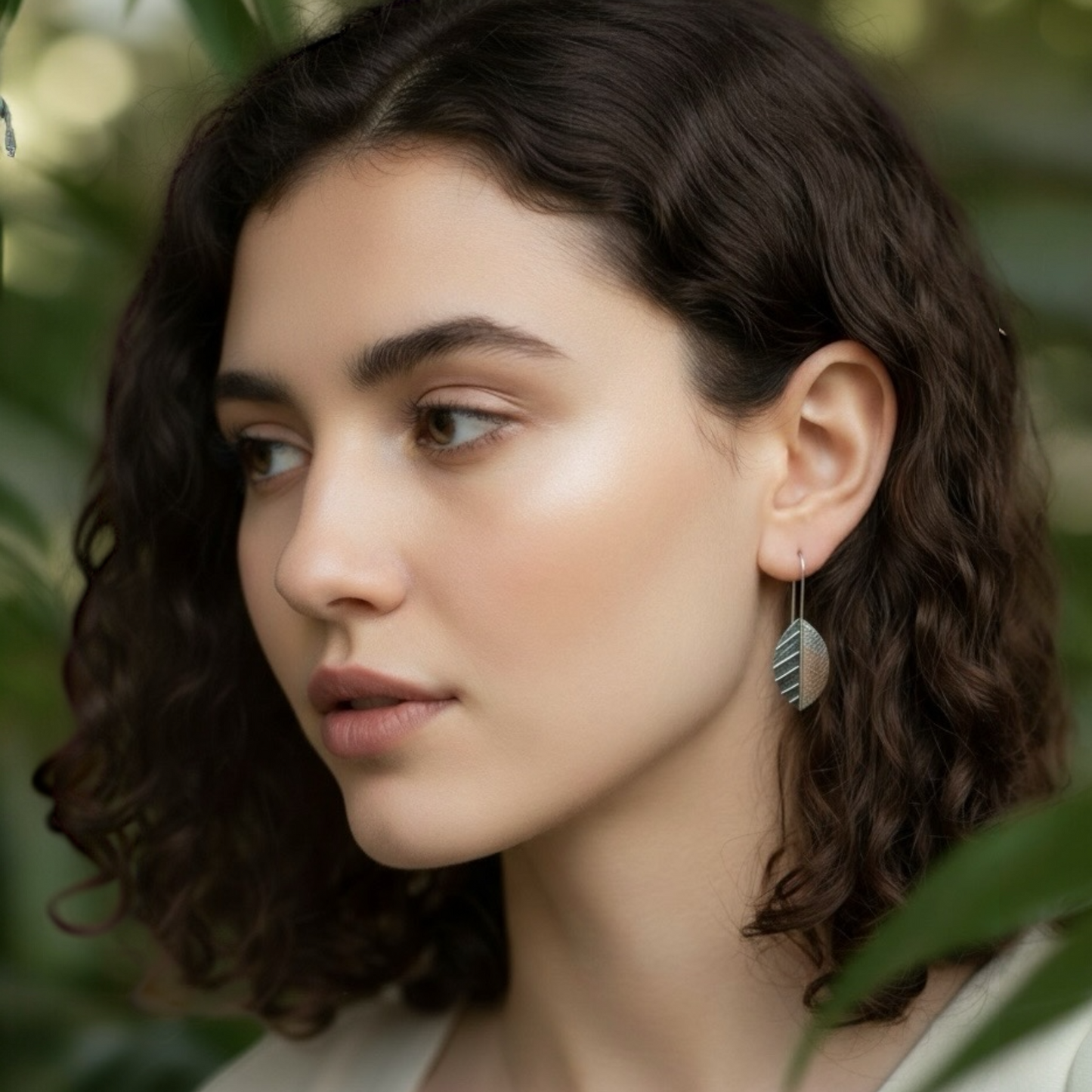 Sterling silver leaf earrings.