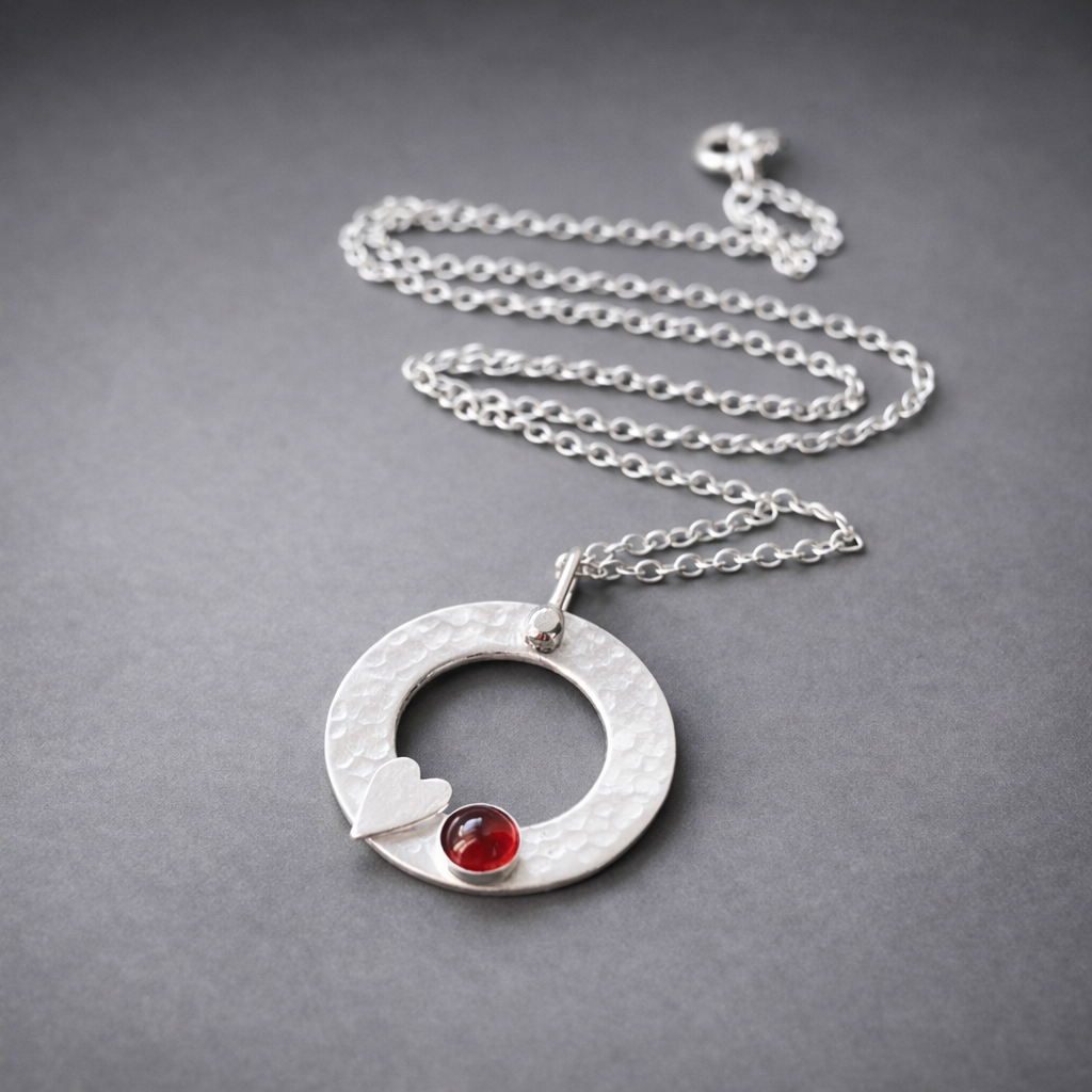 Sterling silver garnet circle necklace