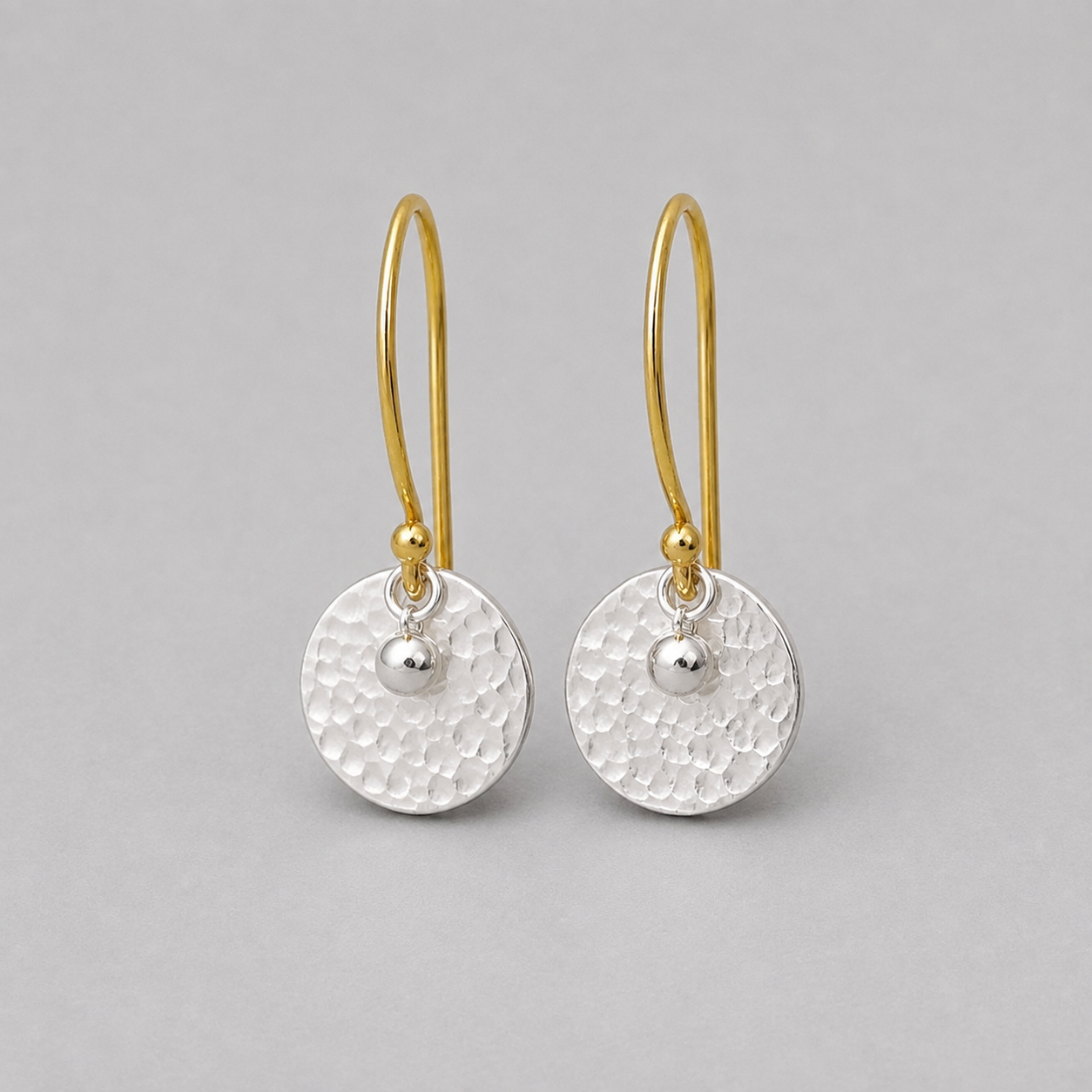 Gold vermeil, sterling silver disc and ball earrings.