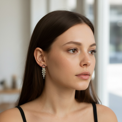 Sterling silver dangle earrings.