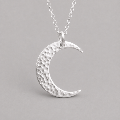 Crescent moon sterling silver necklace.