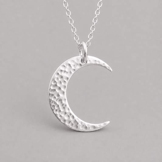 Crescent moon sterling silver necklace.