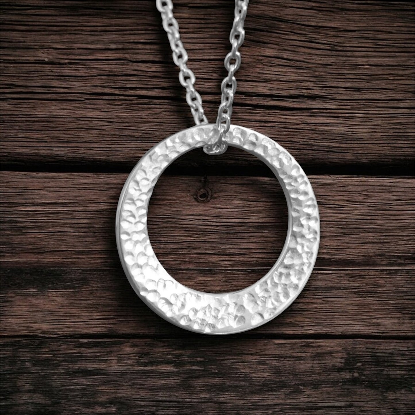 Minimalist hammered sterling silver washer necklace.