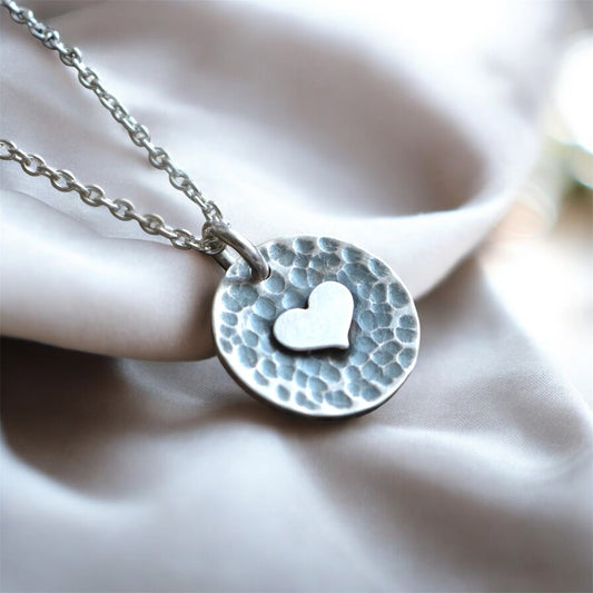 Sterling silver heart disc pendant