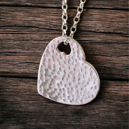 Hammered sterling silver heart necklace pendant.