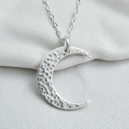 Crescent moon sterling silver necklace.