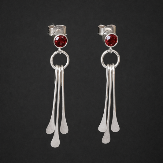 Garnet sterling silver dangle stud earrings.