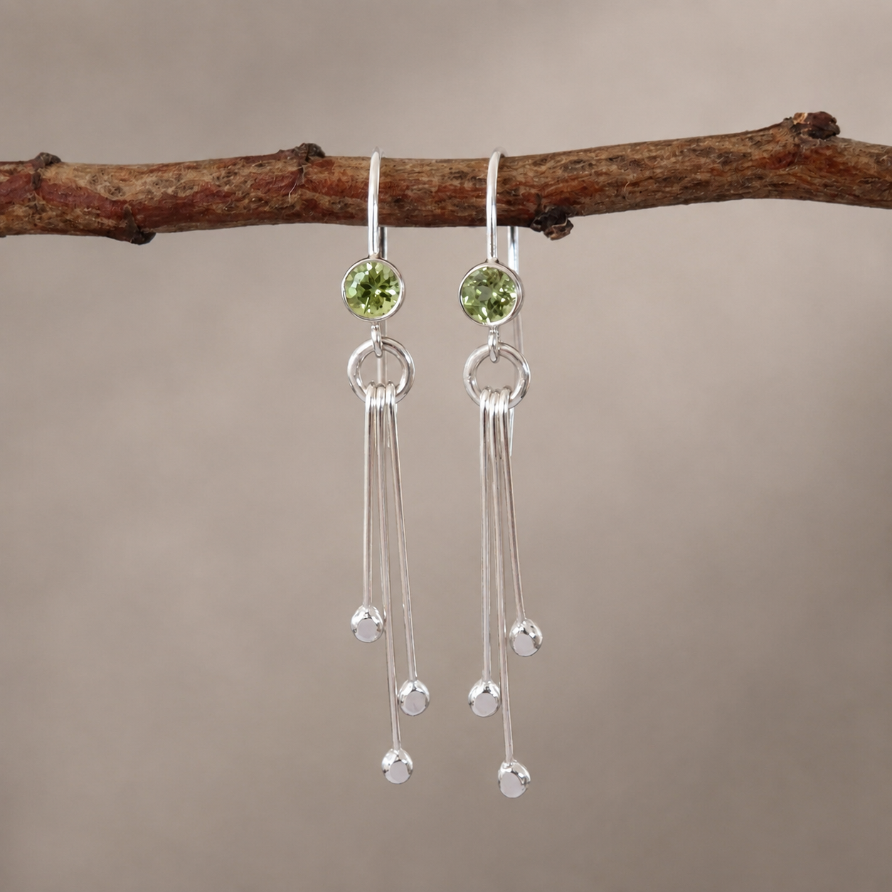 Peridot birthstone sterling silver dangle earrings.
