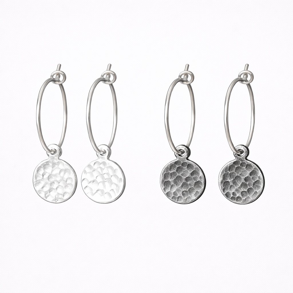 Hammered sterling silver disc charm hoop earrings.