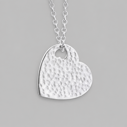 Hammered sterling silver heart necklace pendant.