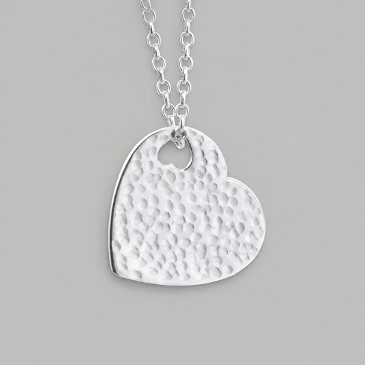 Hammered sterling silver heart necklace pendant.