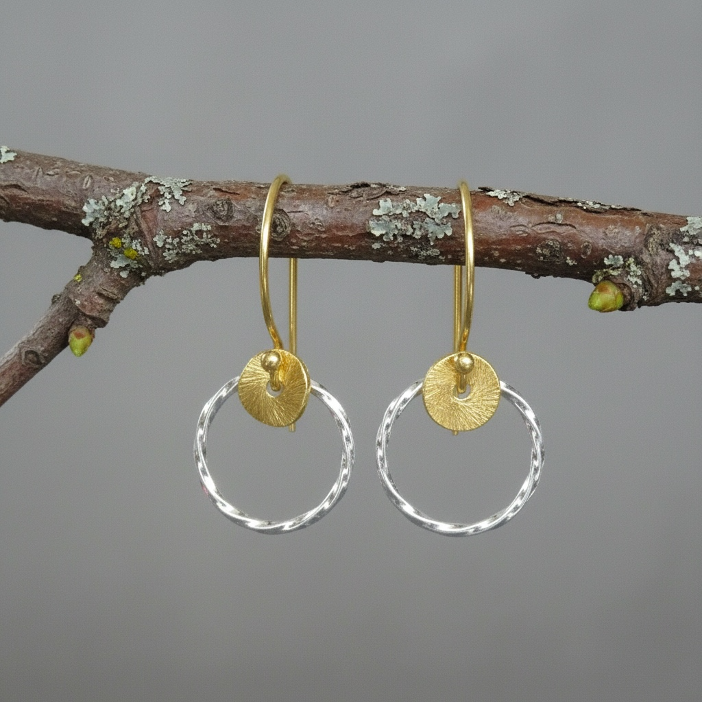 Sterling silver twisted circle earrings.