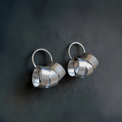 Sterling silver circle stud earrings.