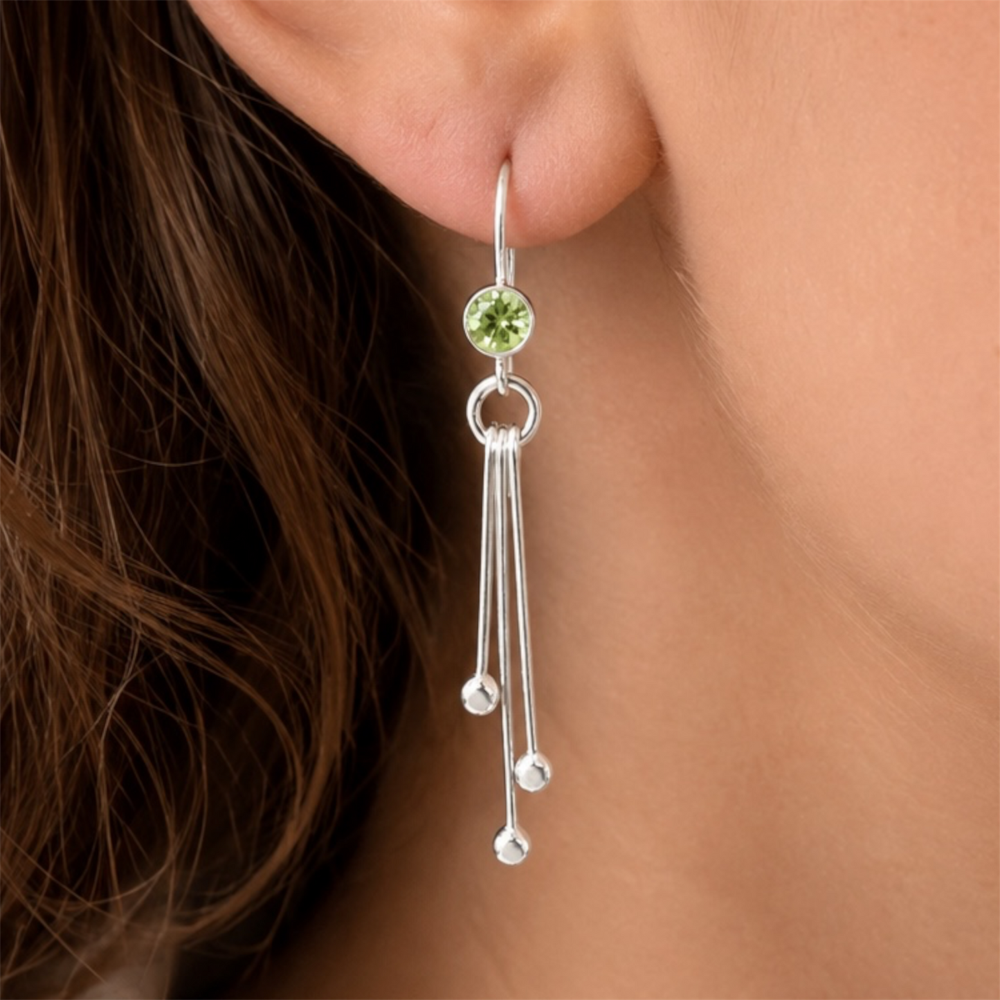 Peridot birthstone sterling silver dangle earrings.