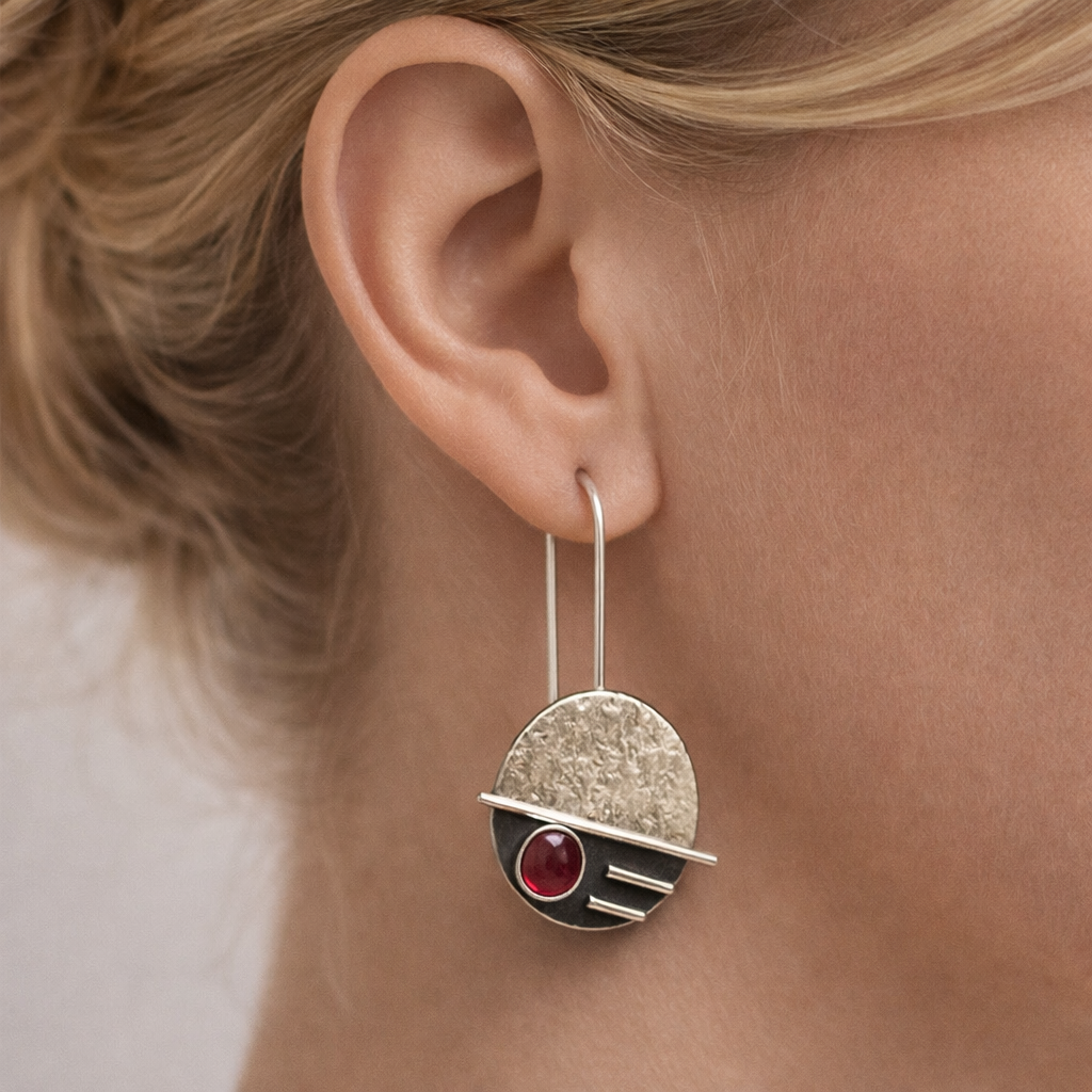 Sterling silver garnet earrings.