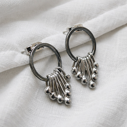 Sterling silver oxidised circle dangle studs.