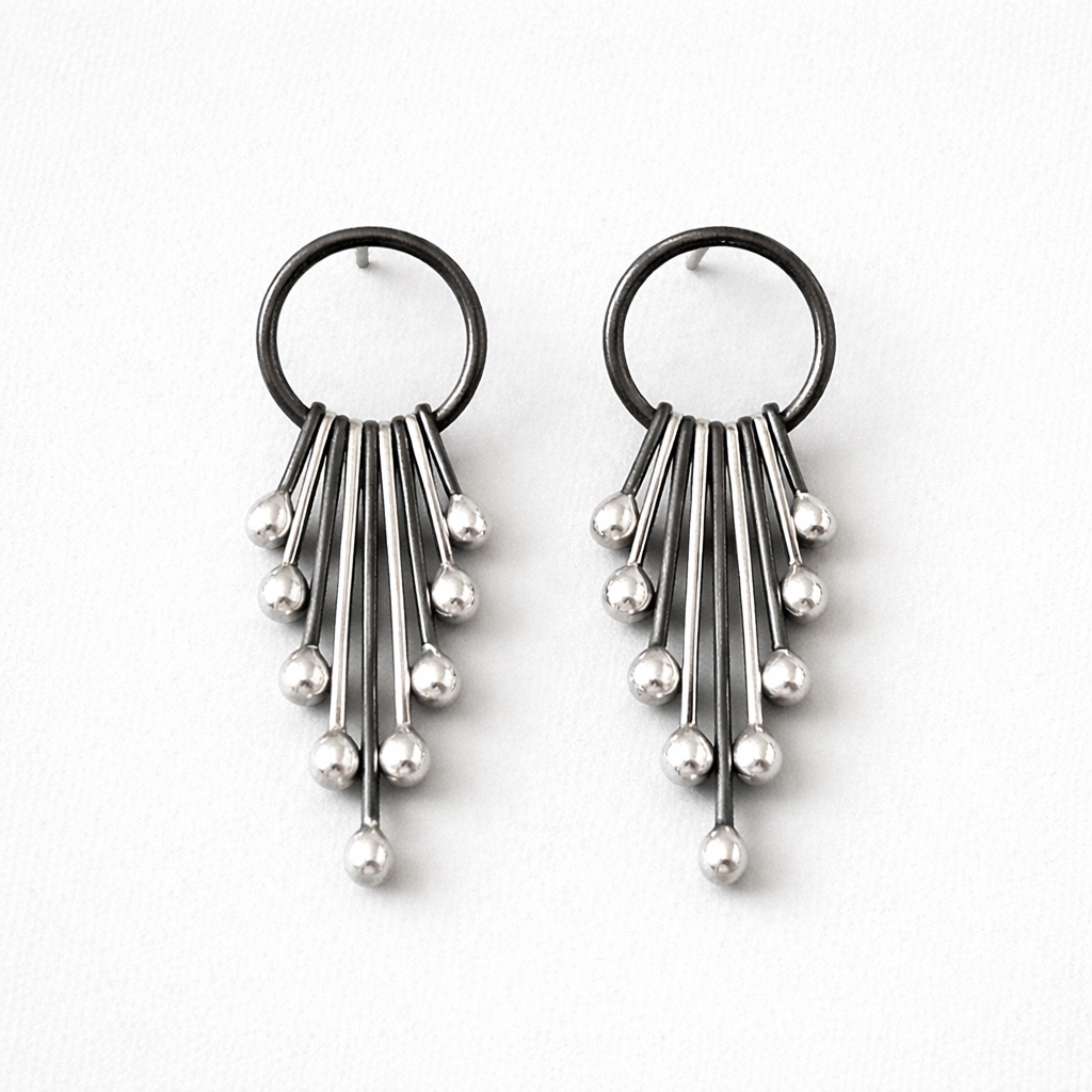 Handmade long sterling silver stud earrings.