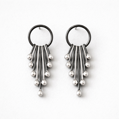 Handmade long sterling silver stud earrings.