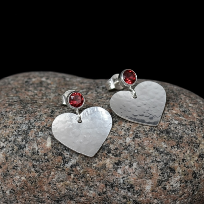 Garnet January birthstone sterling silver heart stud earrings.