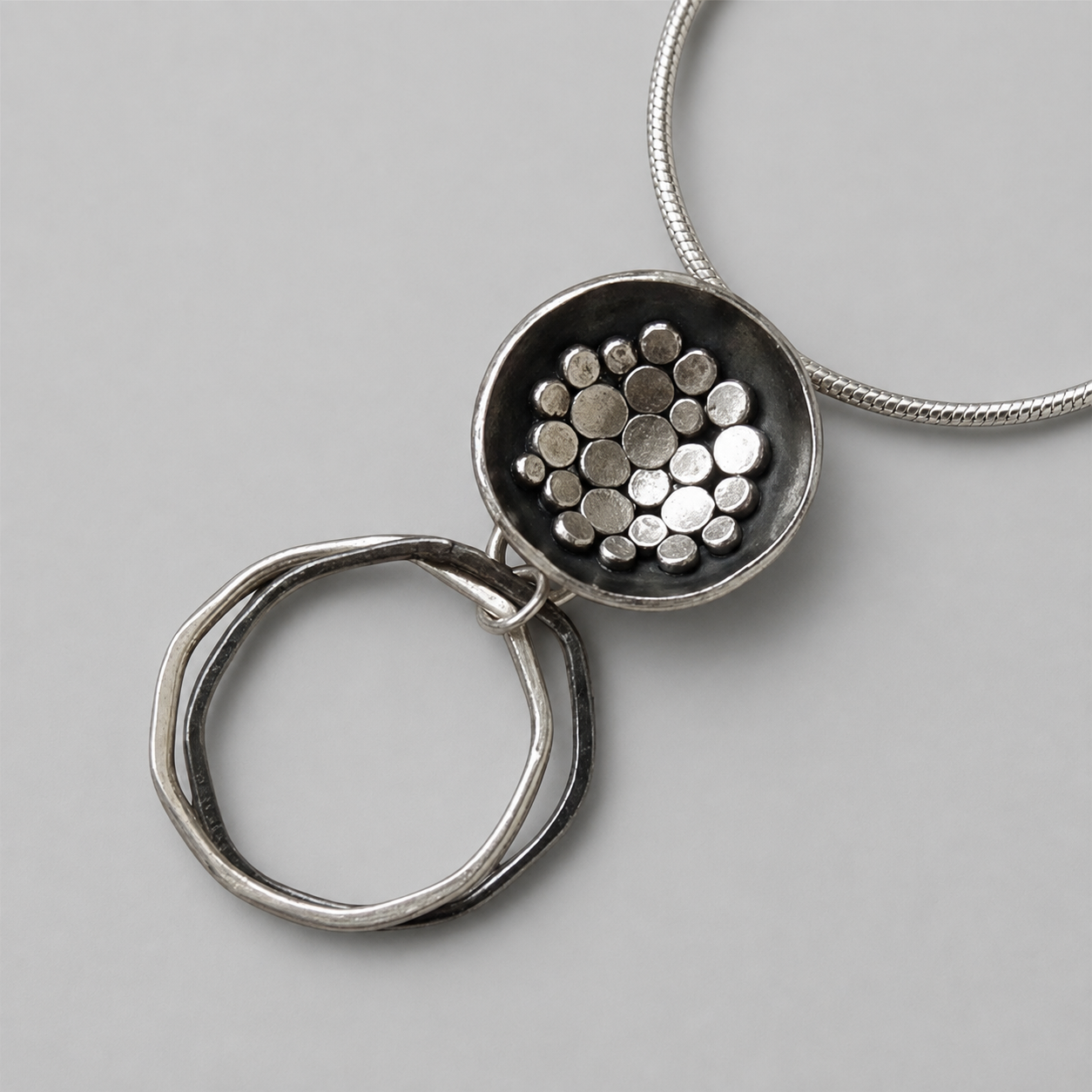 Handmade oxidised sterling silver bowl pendant necklace.
