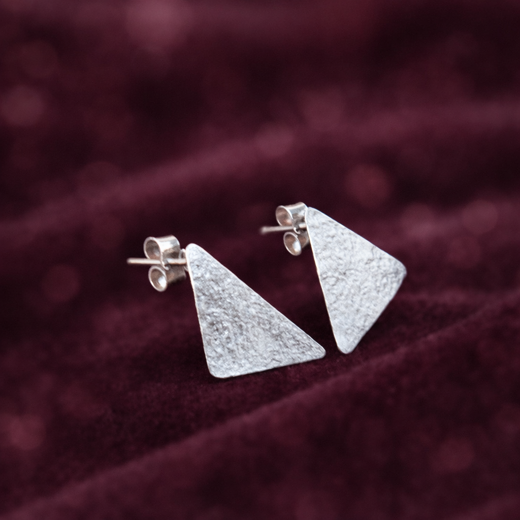 Triangle sterling silver stud earrings.