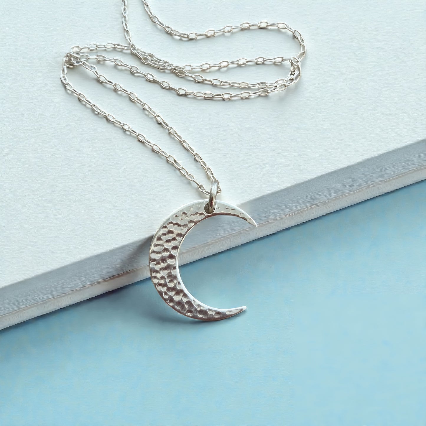 Crescent moon sterling silver necklace.