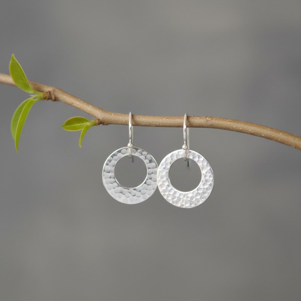 Hammered circle sterling silver earrings.