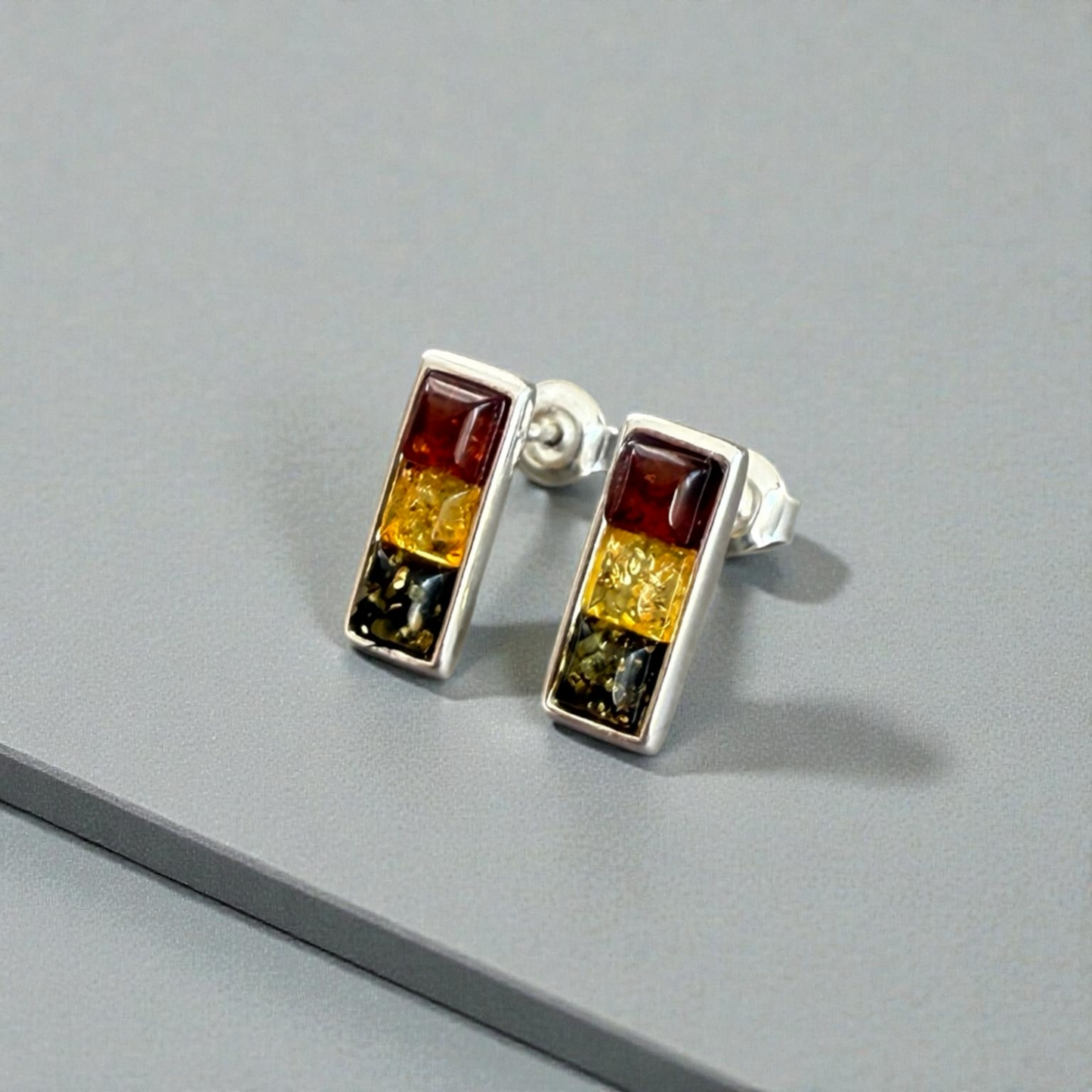 Sterling Silver Stud Earrings with a Trio of Amber Stones