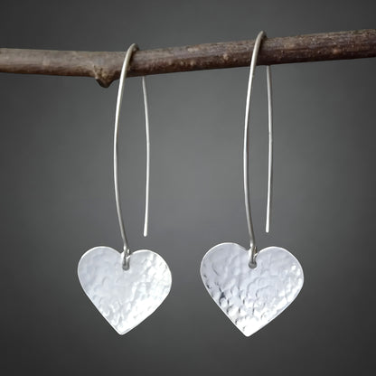 Sterling silver dangle heart earrings