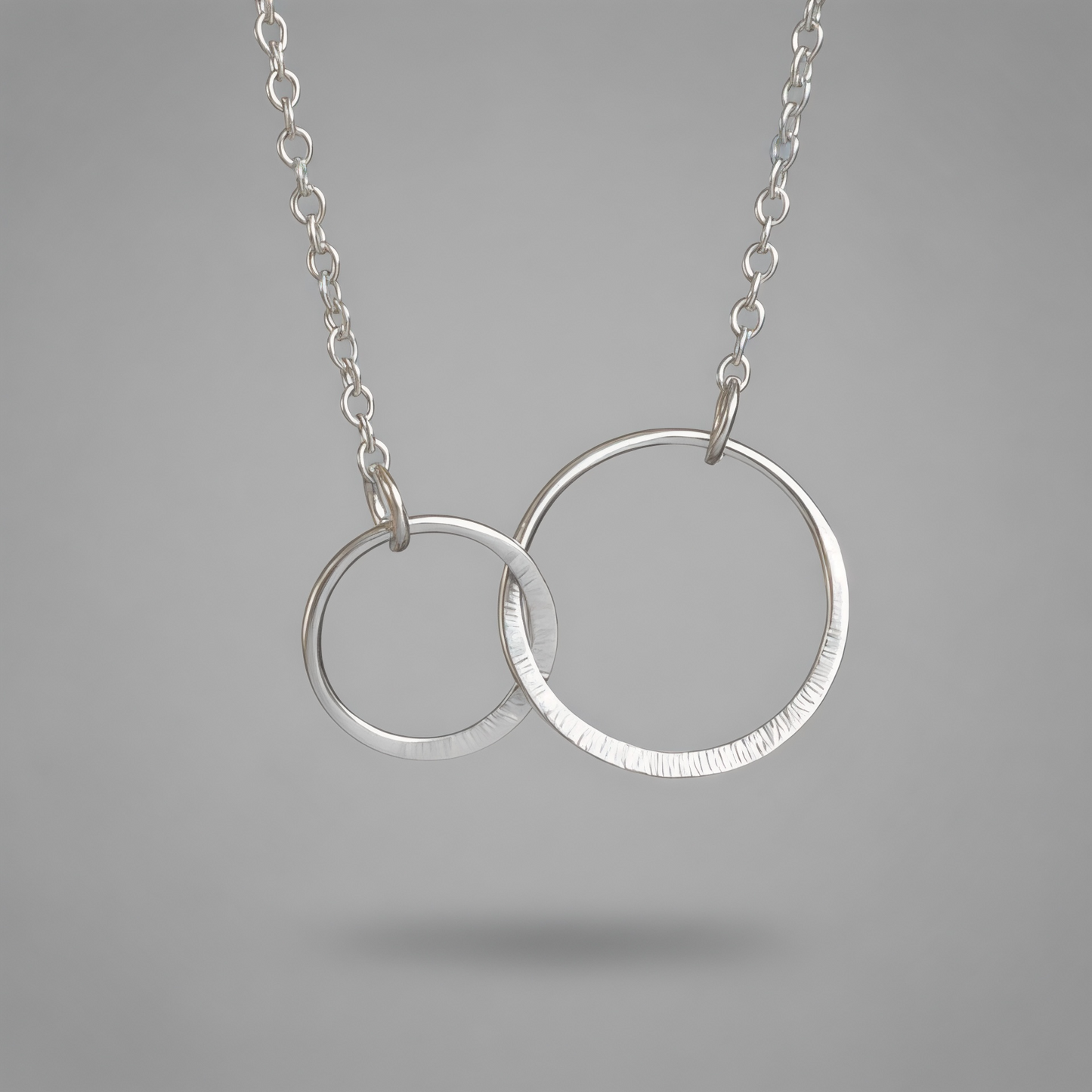 Sterling silver infinity necklace.