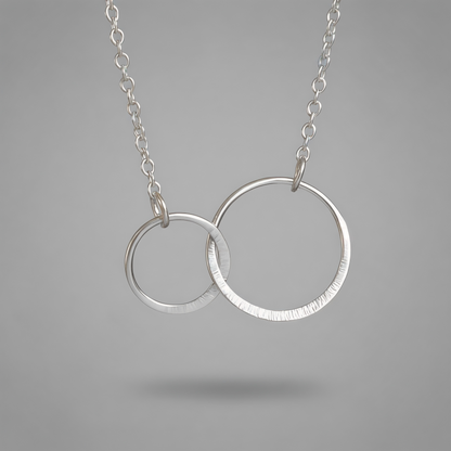 Sterling silver infinity necklace.