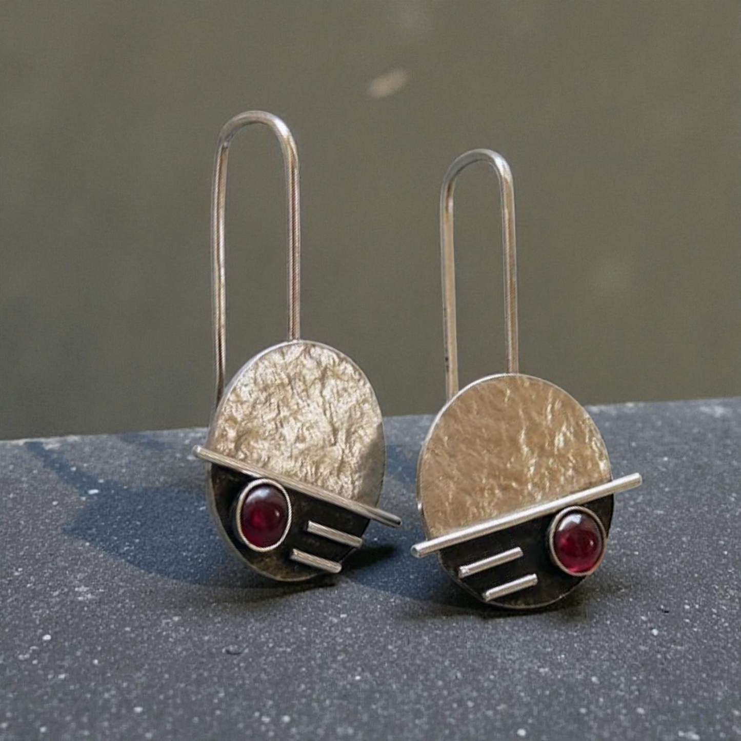 Sterling silver garnet earrings.