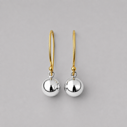 Gold and silver ball dangle earrings