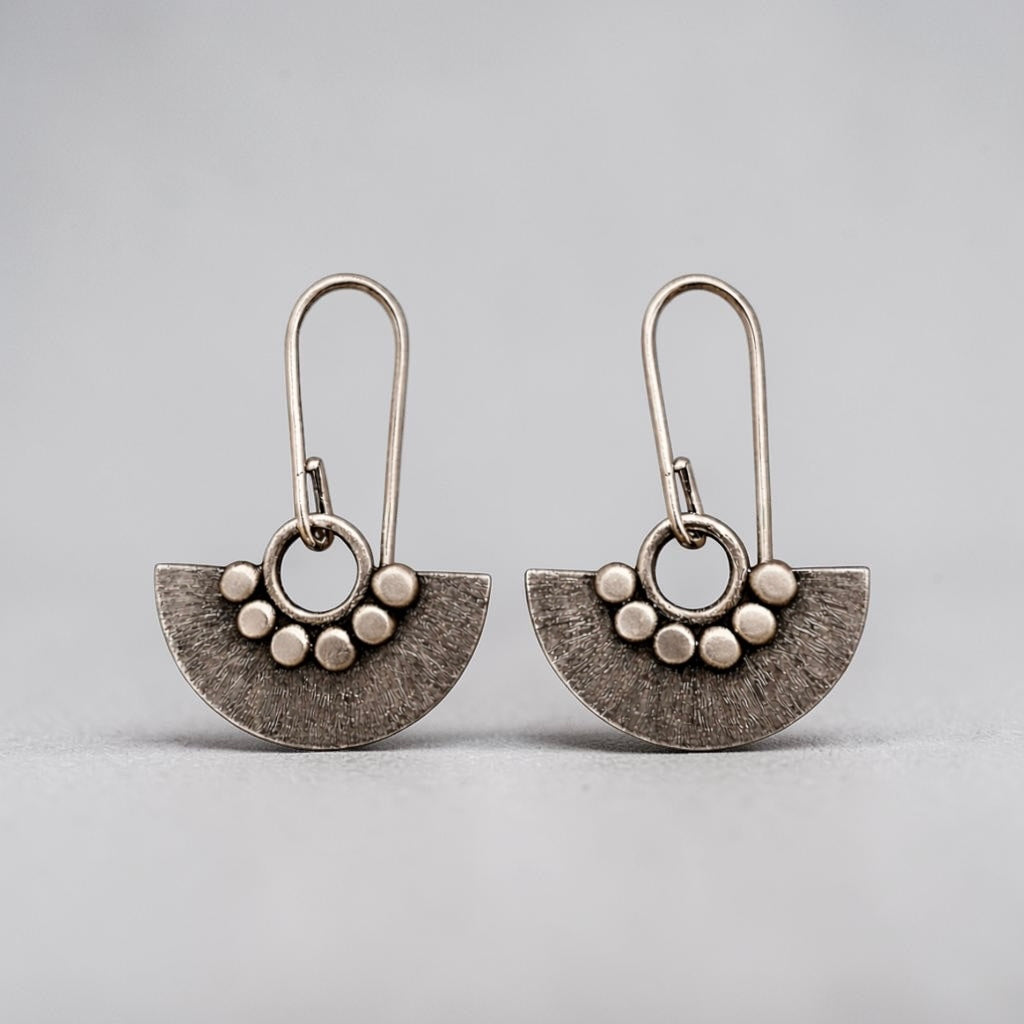Sterling silver dangle fan earrings.