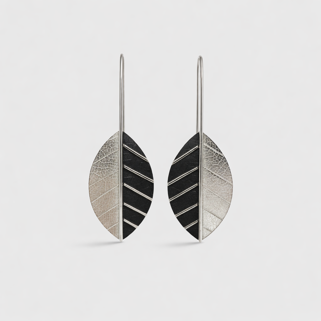 Sterling silver leaf earrings.