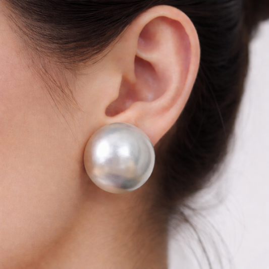 Large statement sterling silver bowl stud earrings.