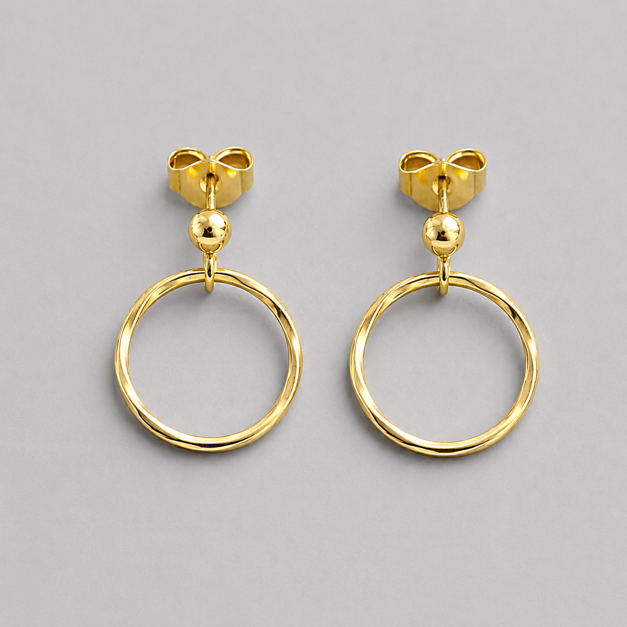 24k gold vermeil ball and circle stud earrings.