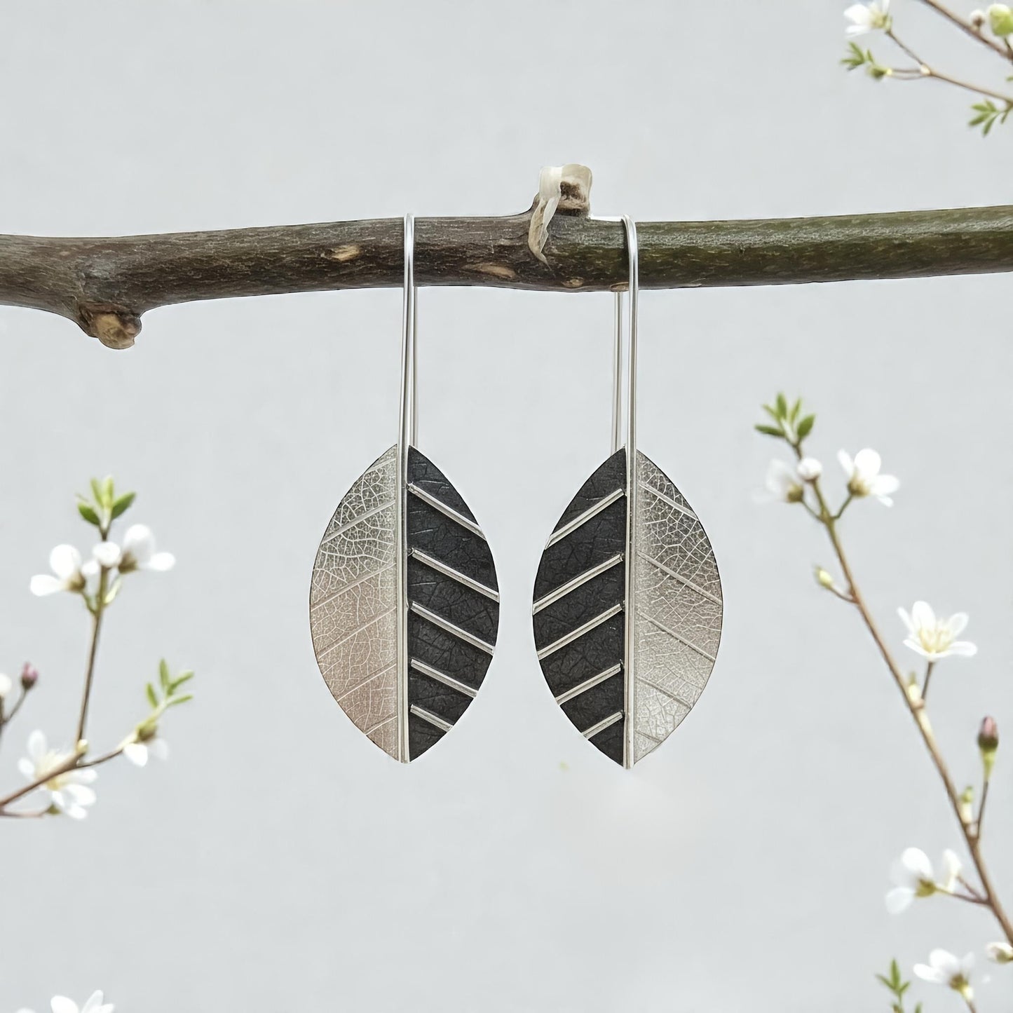 Sterling silver leaf earrings.