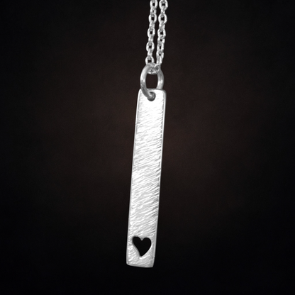 Hammered heart sterling silver rectangular necklace.