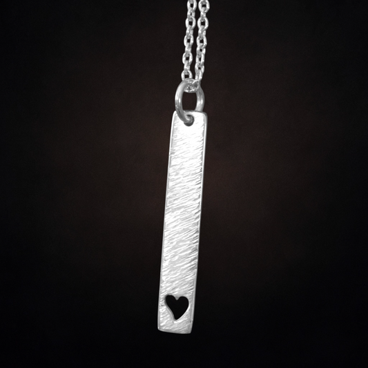 Hammered heart sterling silver rectangular necklace.