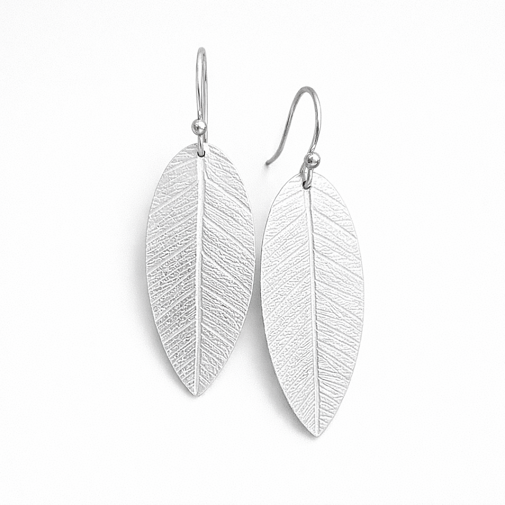 Sterling silver dangle leaf earrings.